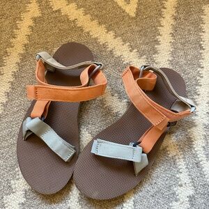 Tevas Orange and Tan Sandals